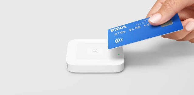 Square Reader for contactless and chip with a card being tapped
